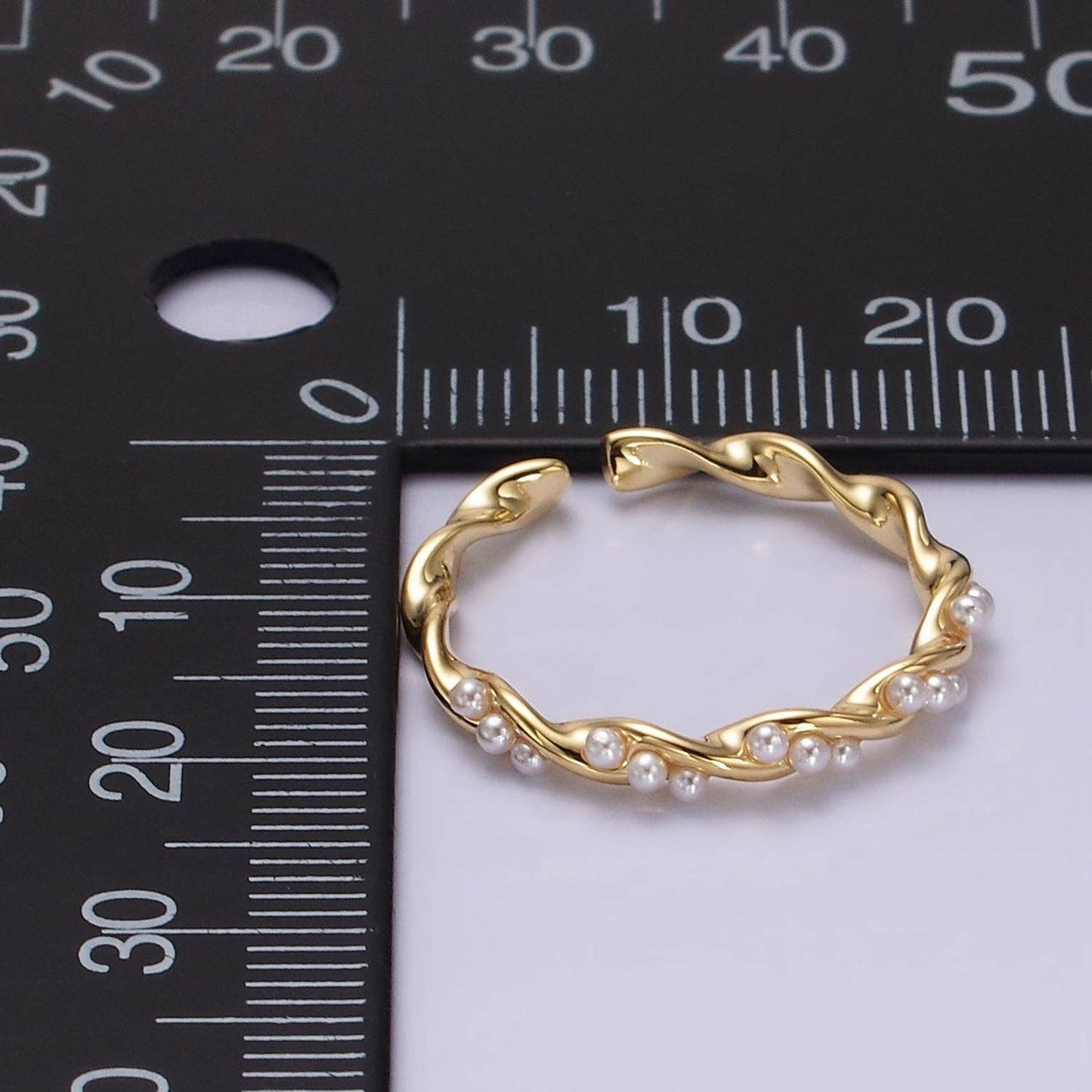 Dotted Pearl Lined Twisted Ring